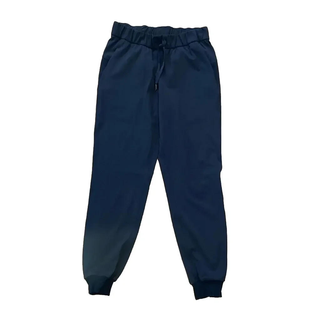 Lululemon Black On the Fly Jogger *Luxtreme Size 4, 28” Inseam